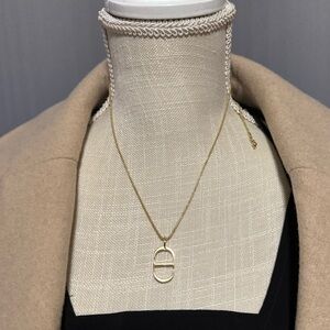 Christian Dior Gold Charm Necklace.
